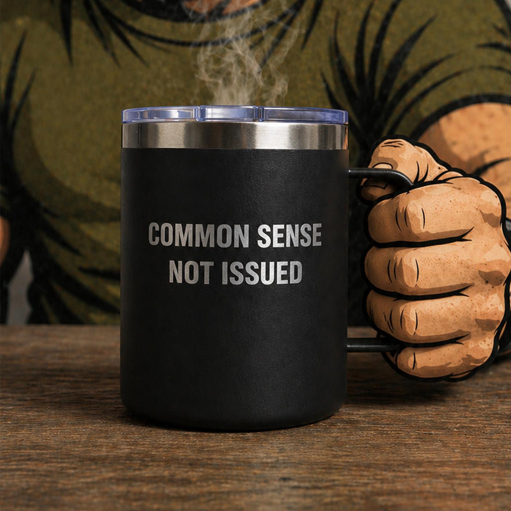 Black mug with 'COMMON SENSE NOT ISSUED' text held by a person wearing a green shirt and brown gloves.